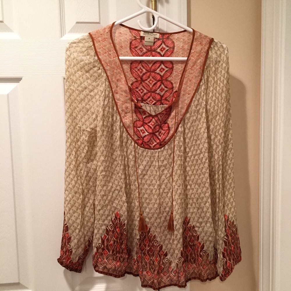 Tan and red pattern blouse